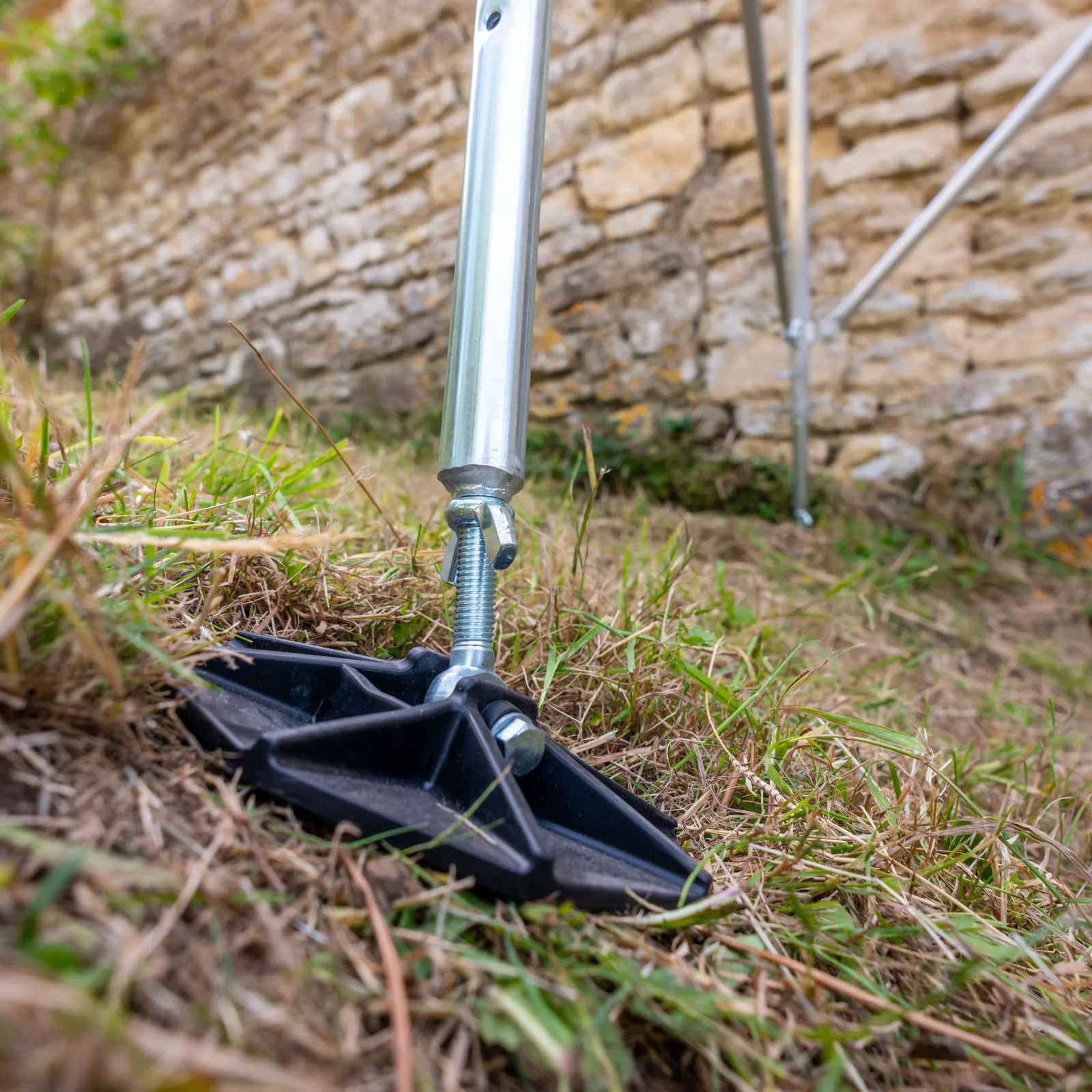 Hi-Step Foot on a grass slope